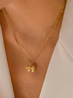 Alanna Bow Necklace: Yellow Gold