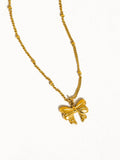 Alanna Bow Necklace: Yellow Gold